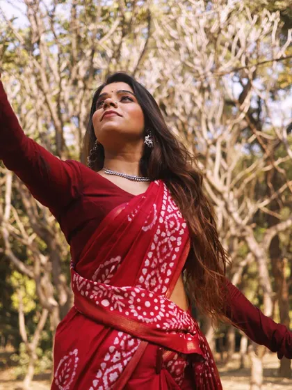 "Kanha, I am colored in Your color." This artistic portrait, taken outdoors, is an expression of my devotion to Krishna, a theme that runs through much of my dance.