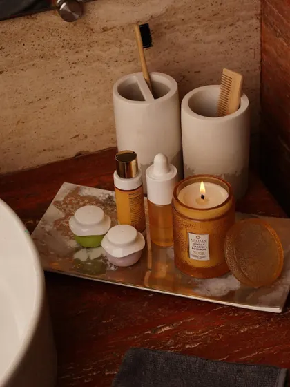 Winding down for the night with our Bombay Orange Bourbon candle. Its warm and comforting scent is the perfect companion for your evening relaxation routine.