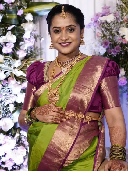 A happy smile from this client at her baby shower. I created a look that was both festive and comfortable, with a focus on flawless skin and a pretty lip colour.