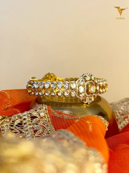A perfect statement bangle for the woman who knows her worth. This Polki diamond bangle is pure, bold, and effortlessly timeless.