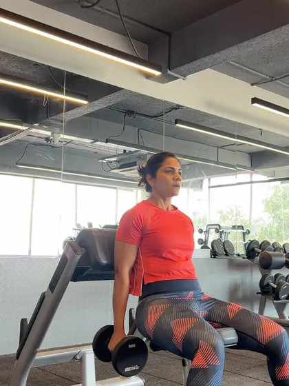 Seated dumbbell shoulder presses are a staple for building strong delts. Focusing on controlled movements as I prepare for my next competition.
