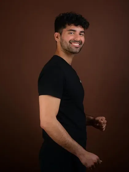 A candid, happy moment. This shows an actor's natural smile and positive energy, a key look to have in any versatile acting portfolio.