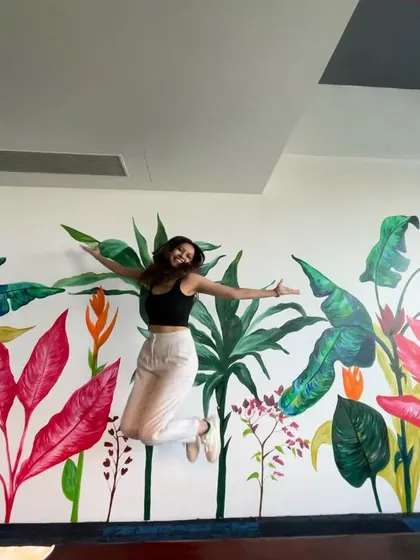 Jumping for joy in front of one of my favorite tropical murals from this year. The scale and color of this piece make it so impactful.