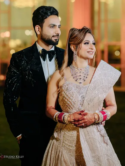 An elegant portrait of the couple at their reception, looking poised and happy.