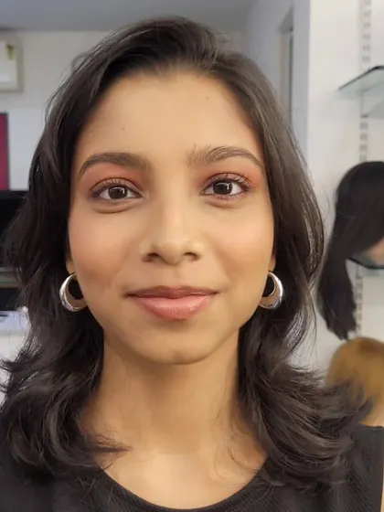 The final result of a last-minute makeup session. This straight makeup look is clean and polished, perfect for any unexpected event.