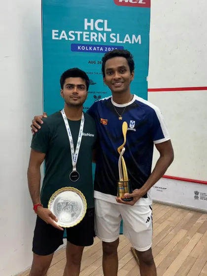 My player with his opponent after the final match, showcasing sportsmanship alongside competitive success at the HCL Eastern Slam.
