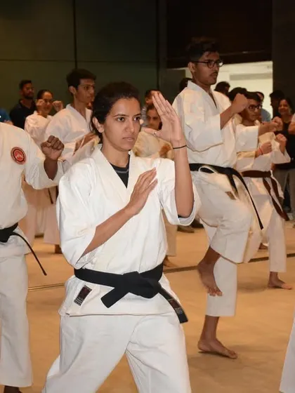A group of our black belt students during a training session at the newly inaugurated P.J. Hindu Gymkhana dojo. The focus and intensity are palpable as they practice their forms.