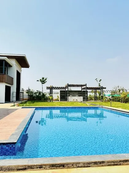 Our team is seen completing the final touches on the surrounding landscape, ensuring every detail is perfect.