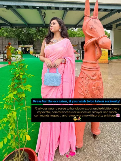 Dressing for the occasion is a power move. I always wear a saree to handloom expos because it communicates seriousness as a buyer and empowers me. This pink saree with a contrasting blue bag is a perfect example of using color to make a statement.