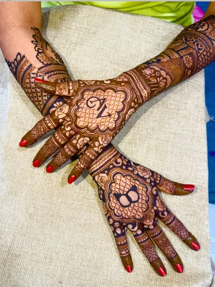 A creative design with the initial 'Z' in a beautiful mandala on the back of the hand.