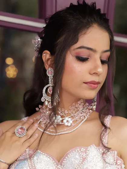 The complete pink floral jewellery set, including earrings and a ring, perfect for a bridesmaid or for a pre-wedding event.