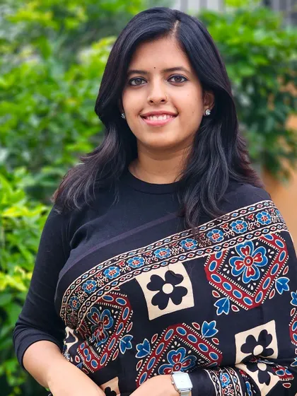 A client looking chic and traditional in a beautiful Ajrakh saree. The intricate hand-block print is perfect for those who love the charm of traditional wear.