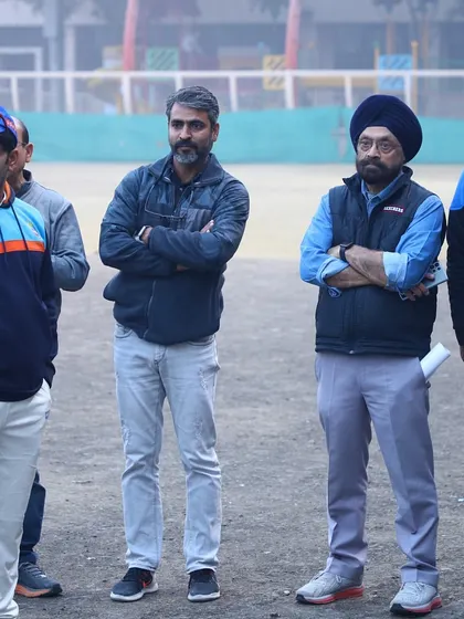 Our coaching staff, alongside Chief Guest Ajay Ratra, observing the young talent on display during the tournament.