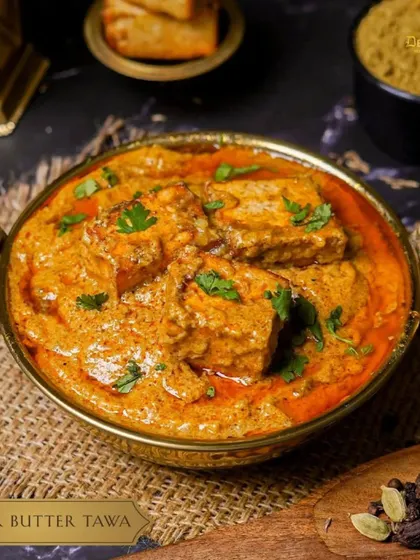 Savor the buttery goodness of our Paneer Butter Tawa, with perfectly grilled paneer in a rich sauce that will have you coming back for more.