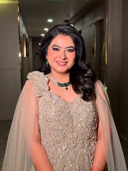 Sanchi, all smiles on her engagement night. My goal is to make my clients feel happy and confident.