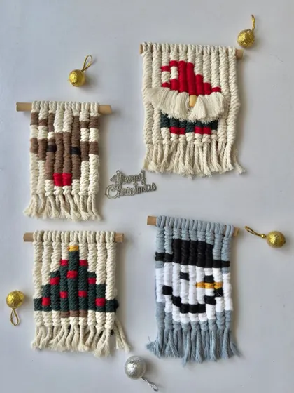 The full set of four mini Christmas wall hangings, a perfect collection to decorate a small space.