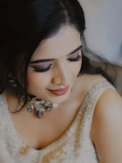 A soft and gentle portrait of the bride-to-be, capturing her natural beauty and the happiness of her engagement day.
