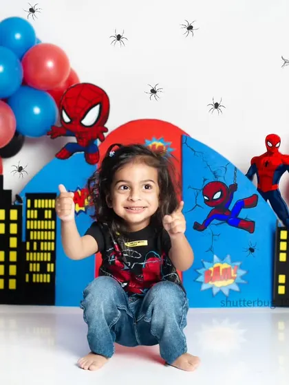 Two thumbs up from our friendly neighborhood Spiderman! We love capturing the energy and excitement of your child's favorite heroes.
