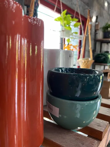 A close-up shot of our ceramic planters, highlighting the rich glazes and textures. This image was part of our Independence Day celebration, showcasing the colors of our nation in our products.