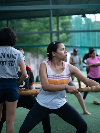 A group of women engaged in a dynamic workout with Gadas. This image shows the energy and focus of our training sessions, where everyone moves together, building strength and community.