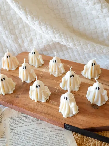 An army of my adorable little ghost candles. They are one of my most popular Halloween items, and they look so cute in a group.