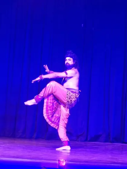 Another angle of my Shiva performance, captured under dramatic blue light. The lighting design is crucial in setting the mood for our mythological productions.