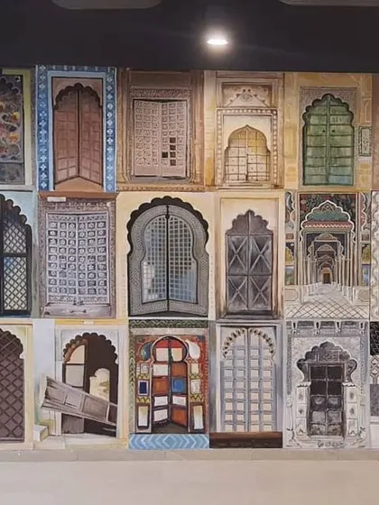 The completed 'Doorways of India' mural at the Tablespace office in Hyderabad. This piece celebrates India's cultural diversity through its eclectic and beautiful doors.