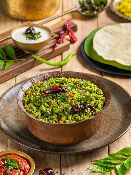 A bowl of flavorful Curry Leaf Rice, showcasing its unique green color and simple, aromatic ingredients.