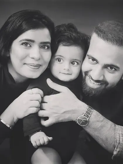 A sweet black and white close-up. This timeless style really captures the emotion and connection between a family.