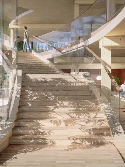 A key feature of our proposal for the IOM Headquarters is a dynamic wooden staircase that winds its way up the building's exterior. This element is not just for circulation but is designed as a social space, with landings that expand into breakout areas for collaboration amidst nature.