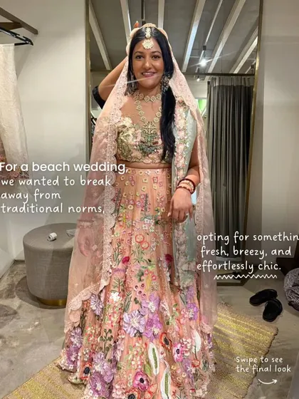 For Hena's beach wedding, we wanted something fresh and breezy. This floral lehenga was the perfect choice, and here you can see us doing the final draping and styling to ensure every detail is perfect for her walk down the aisle.