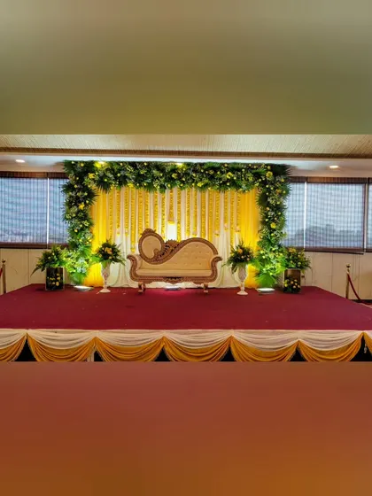 The full view of the yellow floral stage.