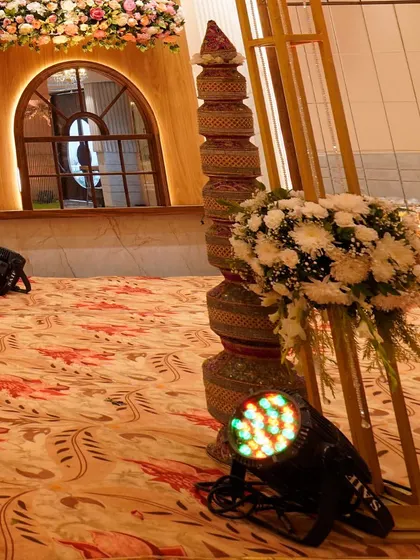 Another detail shot of the stage, highlighting the traditional elements and floral decor that make our setups unique.