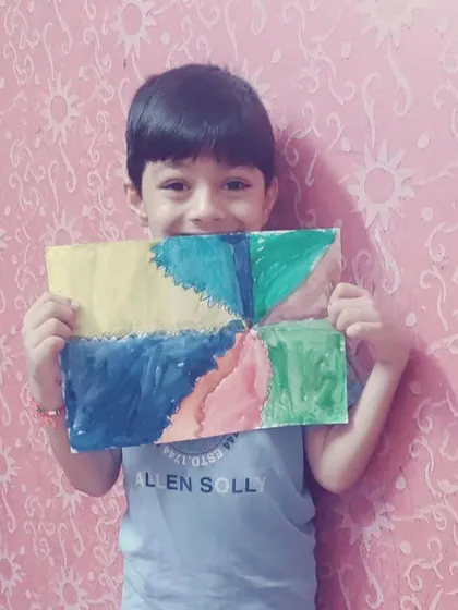 A duplicate of ID 82, this student's smile behind his artwork is the best feedback we can get for our online classes.