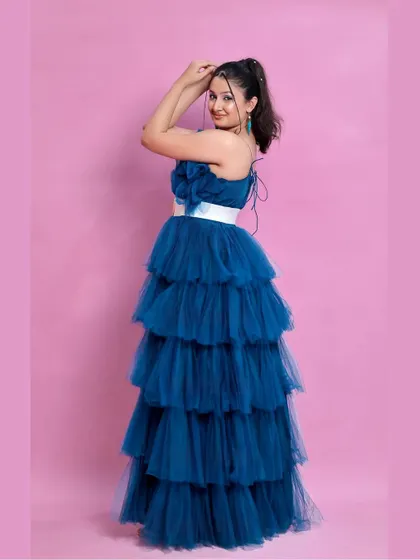 Another great pose showing off the style of the peacock blue gown.