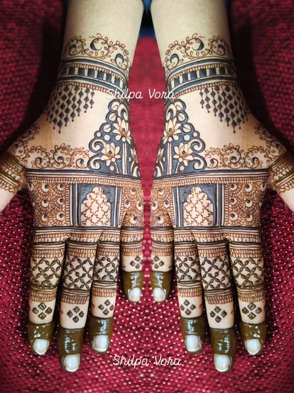 A modern design with geometric shapes and a central cuff, perfect for someone who wants a non-traditional look.