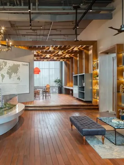 The lounge area within the Emaar DigiHomes Experience Centre. The space is designed to feel like a sophisticated living room, allowing potential buyers to comfortably envision their future home.