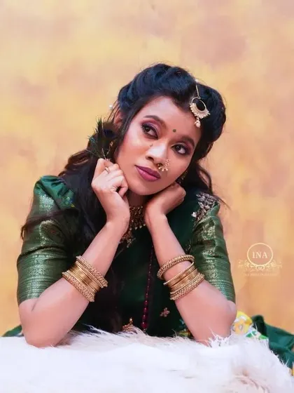 A dreamy shot of a client in the green Kalamkari half saree, perfect for creating artistic portraits.