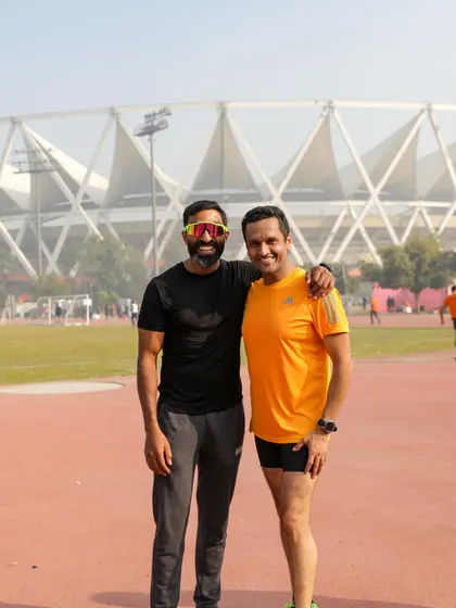 A post-race photo with a runner who achieved a great time of 42:25 in the 10k event. My presence is to encourage every runner to give their best effort.