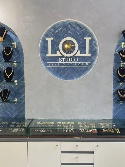 A glimpse into our Mangalore studio, where each jewellery collection is displayed for you to explore. We've designed the space to be welcoming, with our signature blue tile wall showcasing a variety of our handcrafted necklaces and sets.