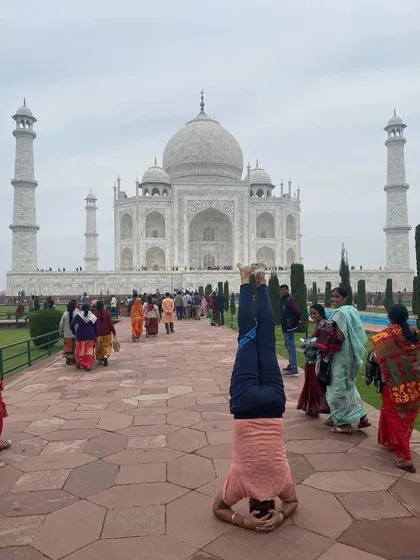 Taking my practice everywhere I go. Doing a headstand in front of the Taj Mahal reminds me that yoga isn't just on the mat, it's a way of seeing the world from a new perspective.