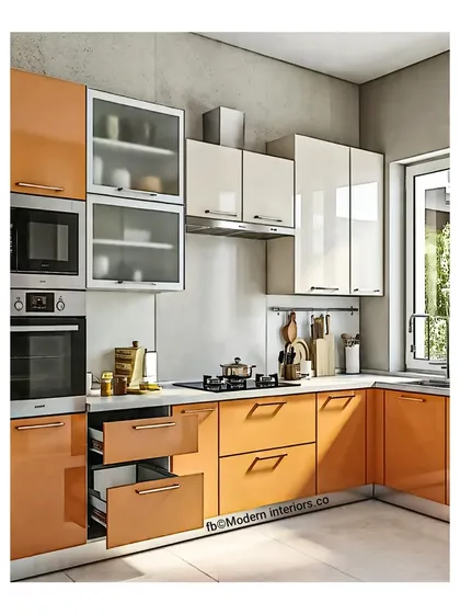 This L-shaped kitchen features a lovely combination of orange and off-white cabinets. The frosted glass on the upper cabinets adds a modern touch, and you can see the practical pull-out drawers that make storage so much easier.