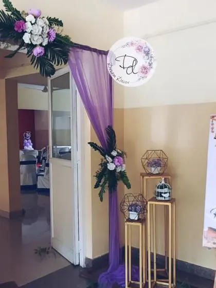 The entrance for the Ram-themed naming ceremony. Purple drapes, floral arrangements, and a custom welcome board set the theme from the very beginning.