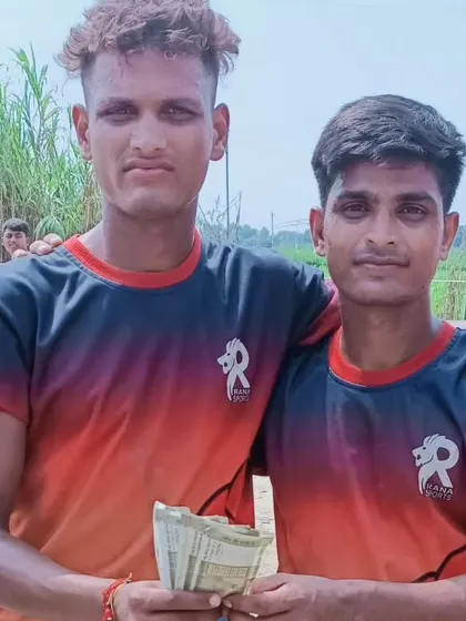 Our best defender with his teammate and prize money after a stellar tournament performance.