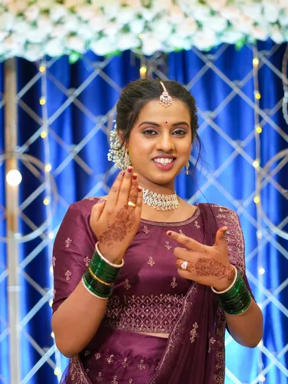 A fun and engaging portrait where the bride shows off her rings. This is a great way to capture excitement and important details simultaneously.