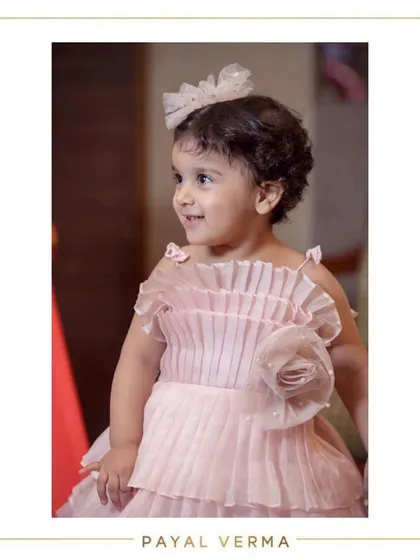 The smile says it all. We love creating birthday dresses that not only look beautiful but also let kids be kids, full of joy and ready to celebrate.