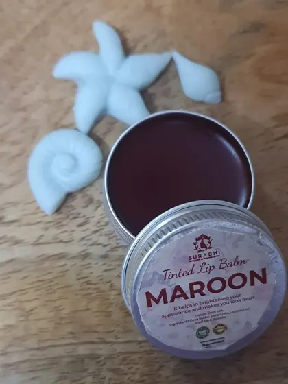 For those who prefer a deeper shade, my Maroon Tinted Lip Balm offers a rich, subtle color. It's perfect for an evening look or for anyone who loves a bolder lip.