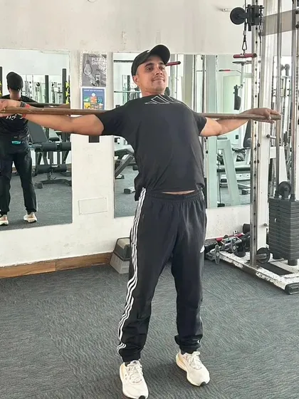Stretching the back and shoulders.