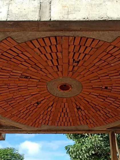 Craftsmanship and material honesty are at the heart of our work. This brick dome is a feature of our 'True Ceiling' series, showcasing a radial pattern of bricks that is not only visually striking but also a functional element of our sustainable design approach.