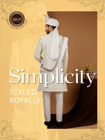 Simplicity styled royally. This full-length view of an off-white sherwani shows how clean lines and detailed craftsmanship create an effortlessly regal look.